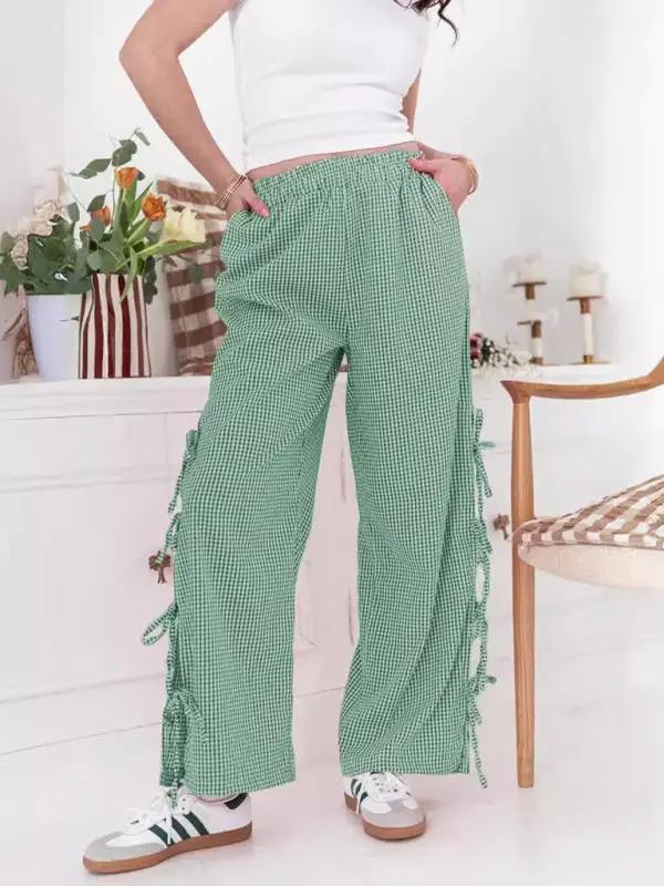 Levoire | Mode dames pantalons carotte avec motif à carreaux et bretelles Vert