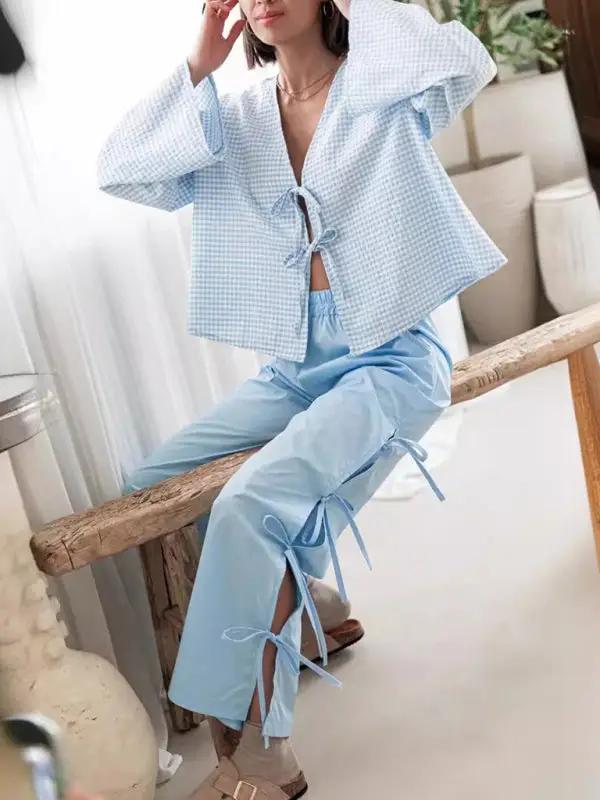 Levoire | Mode dames pantalons carotte avec motif à carreaux et bretelles