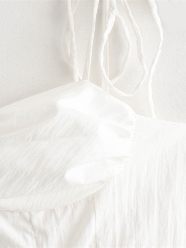 Levoire | Tendance mode et robe à bretelles sans manches en popeline à plusieurs niveaux