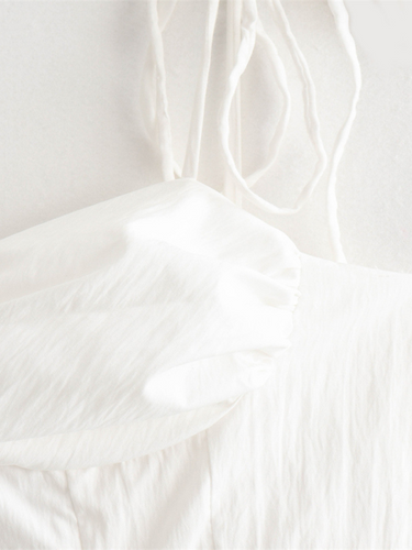 Levoire | Tendance mode et robe à bretelles sans manches en popeline à plusieurs niveaux