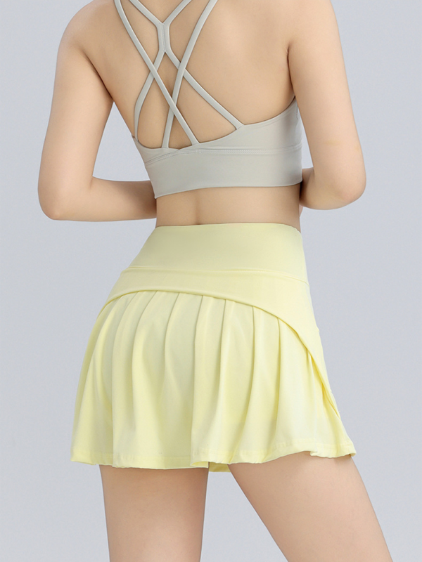 Levoire | Sporty jupe courte anti-expansion taille haute liftante jupe de course respirante en A Jaune