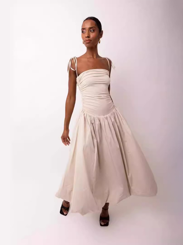 Levoire | Nouvelle robe sans manches à dos ouvert à encolure halter froncée en patchwork avec poches