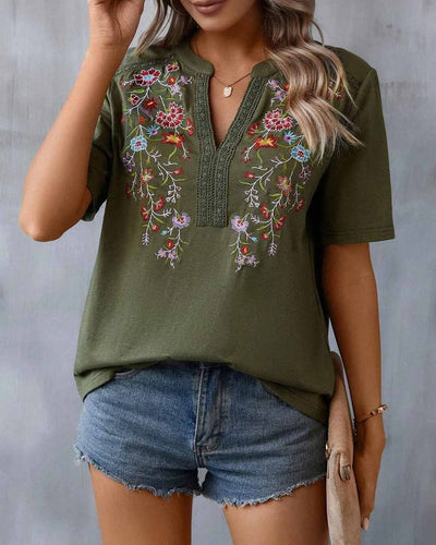 Levoire | Élégante Blouse Avec Détails Floraux V-Cou Et Manches Courtes