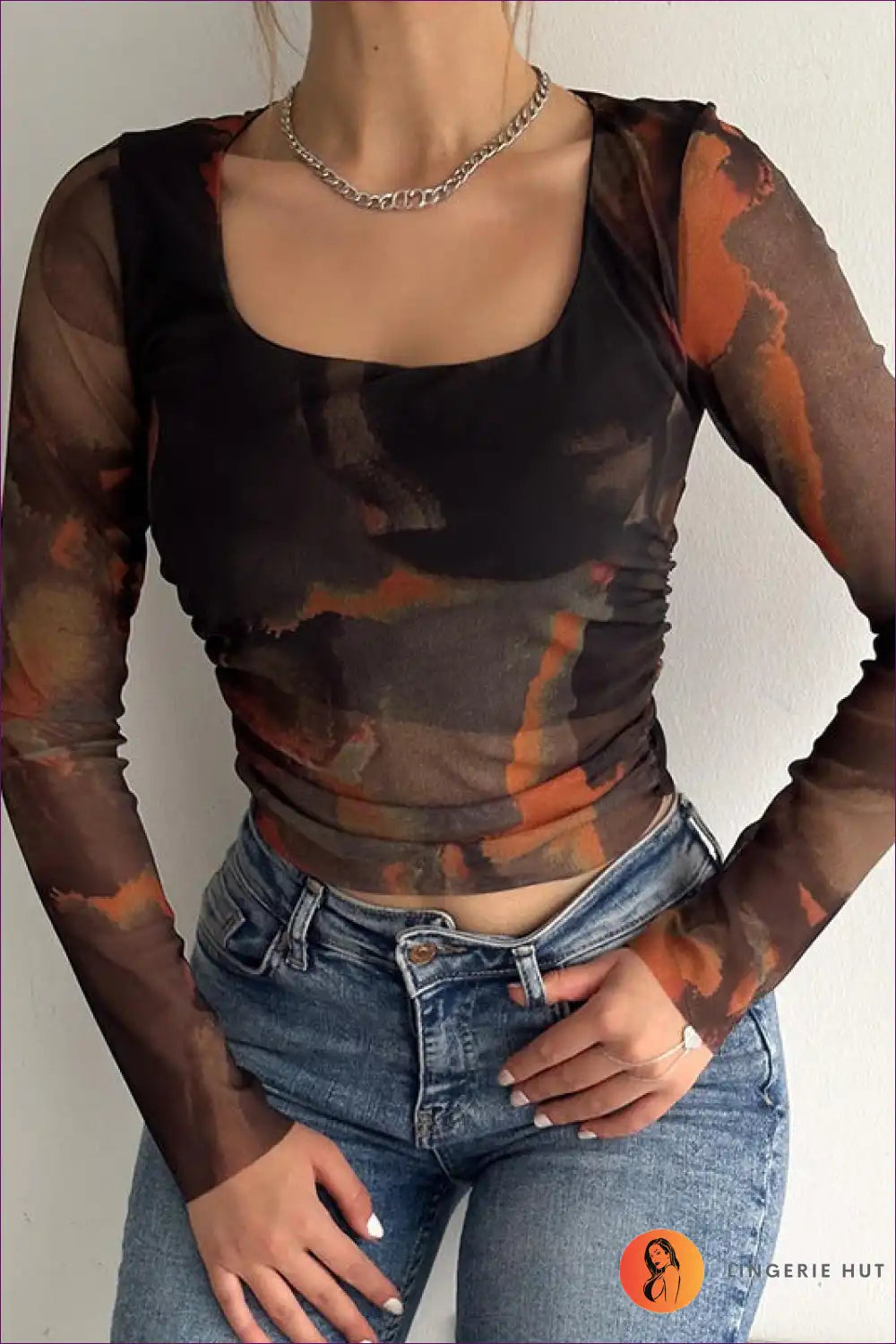 Levoire | Top à manches longues en mesh abstrait – Attraction artistique Orange