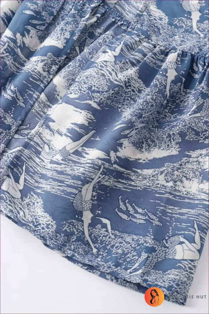 Levoire | Robe mi-longue imprimée bleue élégante