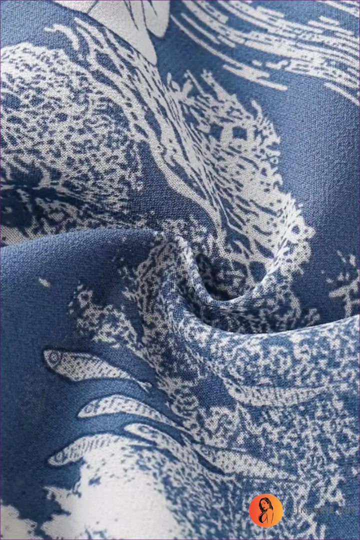 Levoire | Robe mi-longue imprimée bleue élégante
