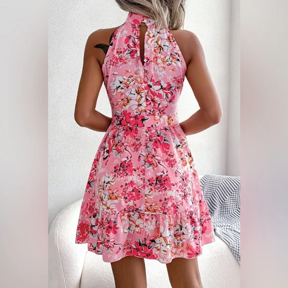 Levoire | Robe trapèze florale à nouer à la taille et ourlet à volants