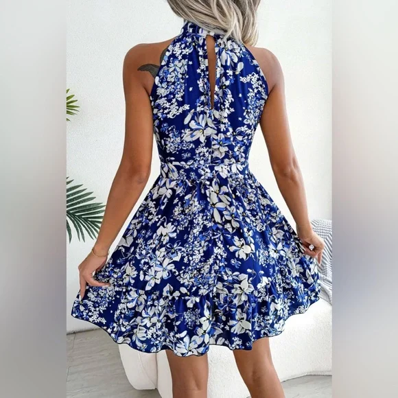 Levoire | Robe trapèze florale à nouer à la taille et ourlet à volants