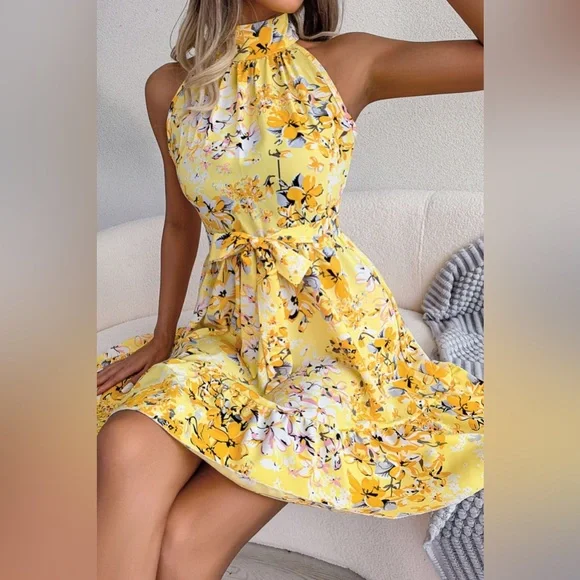 Levoire | Robe trapèze florale à nouer à la taille et ourlet à volants