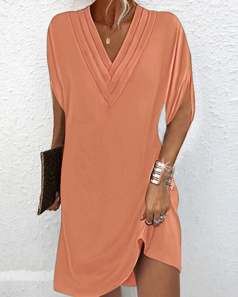 Levoire | Robe Élégante Avec Manches Fendues Dans Une Couleur Unie Orange