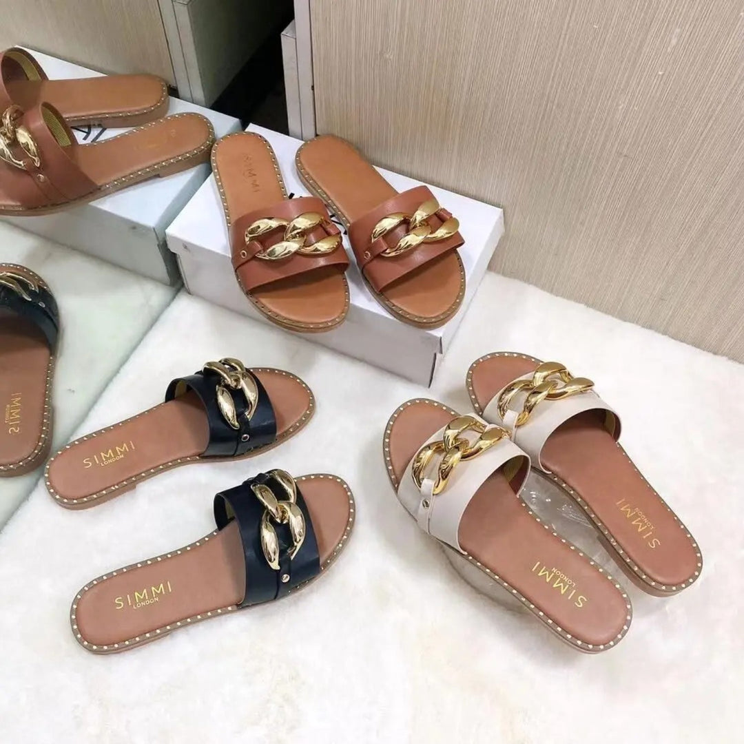 Levoire | Chaussons avec design boucle dorée