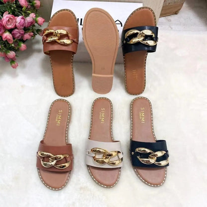 Levoire | Chaussons avec design boucle dorée