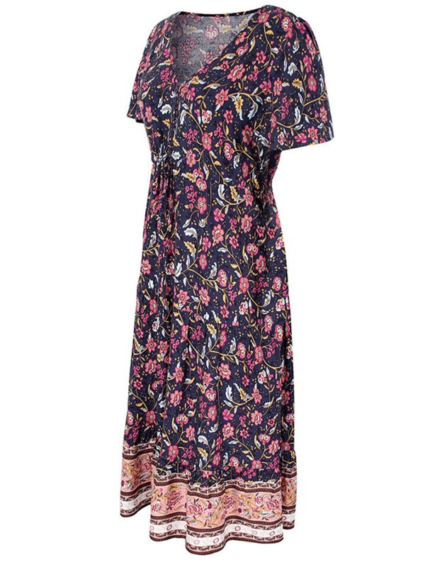 Levoire | Robe mi-longue asymétrique à fleurs petite motif slim-fit avec décolleté en V et manches courtes