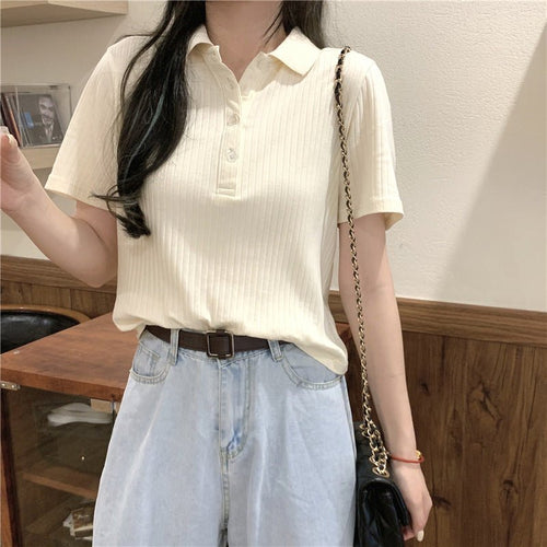 Levoire | Femme Polo à manches courtes en maille côtelée avec large col et boutons