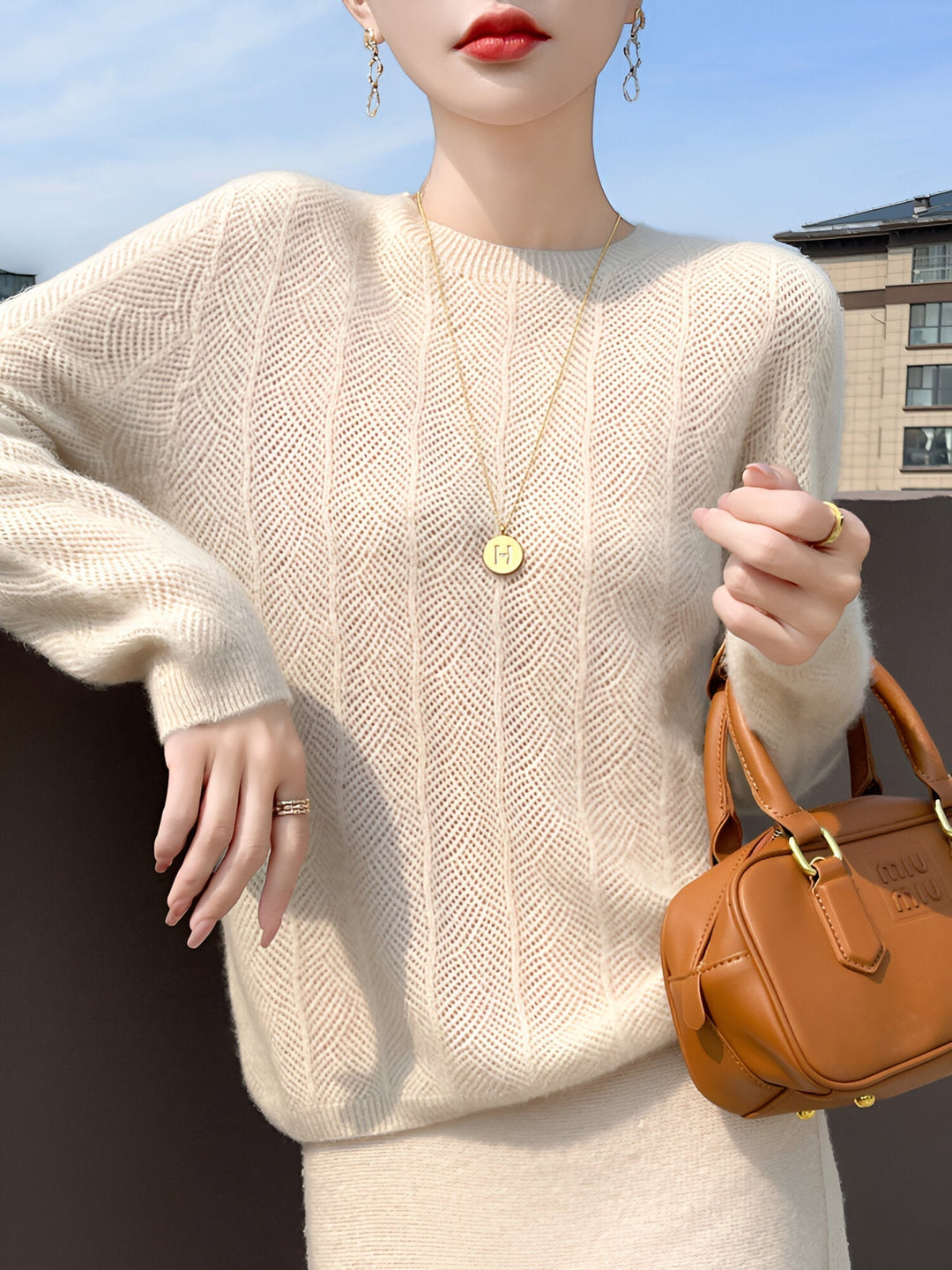 Levoire | Pull En Laine Mérinos Avec Découpes Élégantes Beige